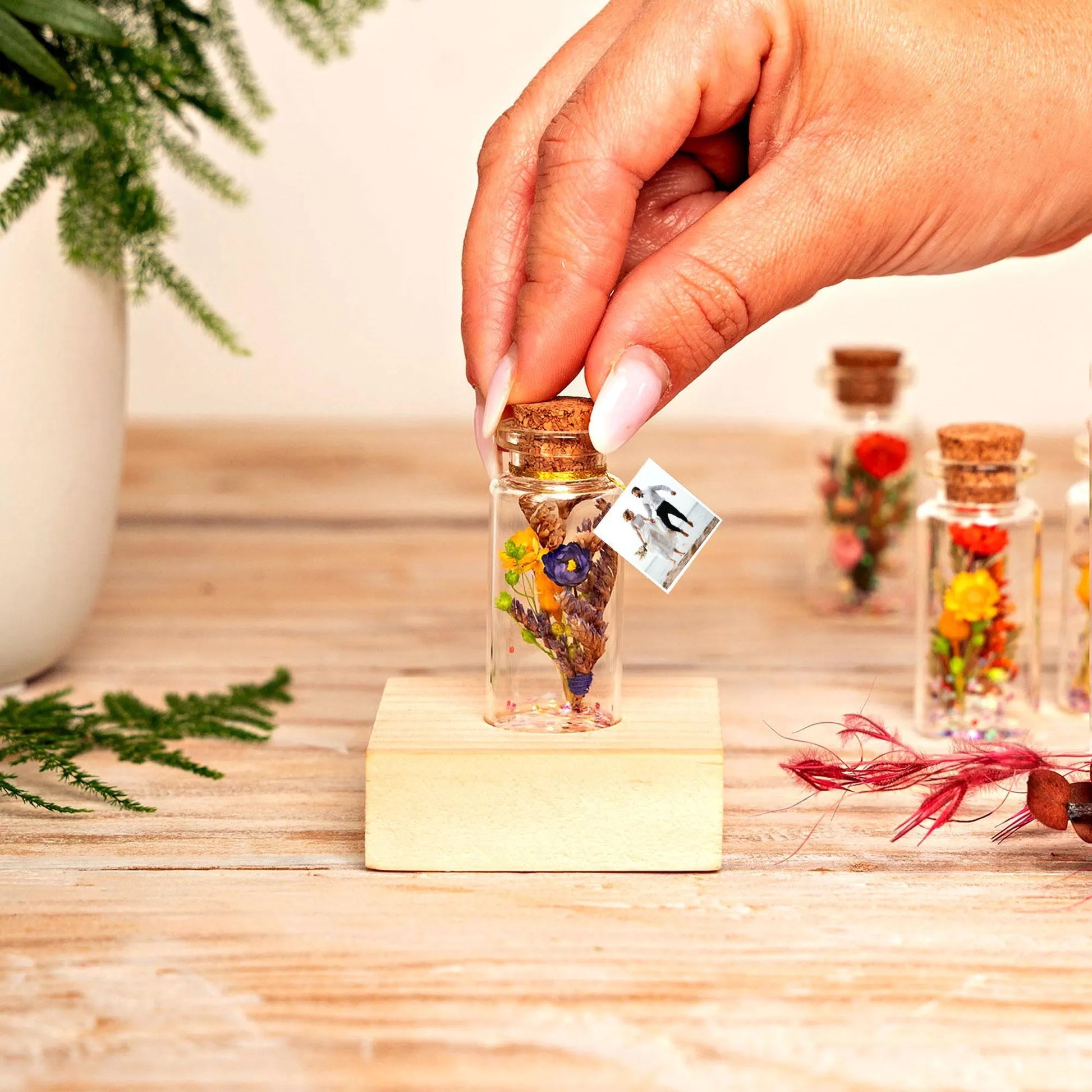 4th anniversary flower bouquet bottle with wooden base display